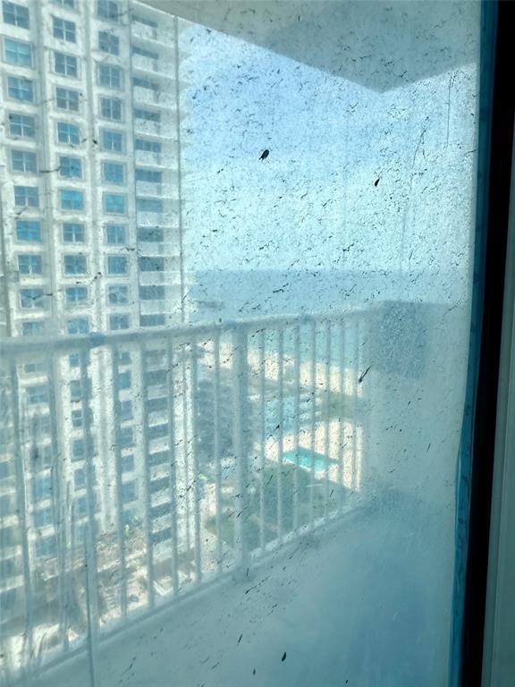 111 Briny Avenue, Unit 1805 Pompano Beach, FL 33062 - Photo 12 of 29 a bathroom with a glass shower