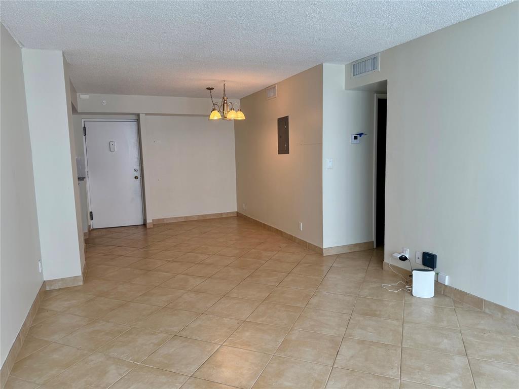 111 Briny Avenue, Unit 1805 Pompano Beach, FL 33062 - Photo 4 of 29 a view of an empty room