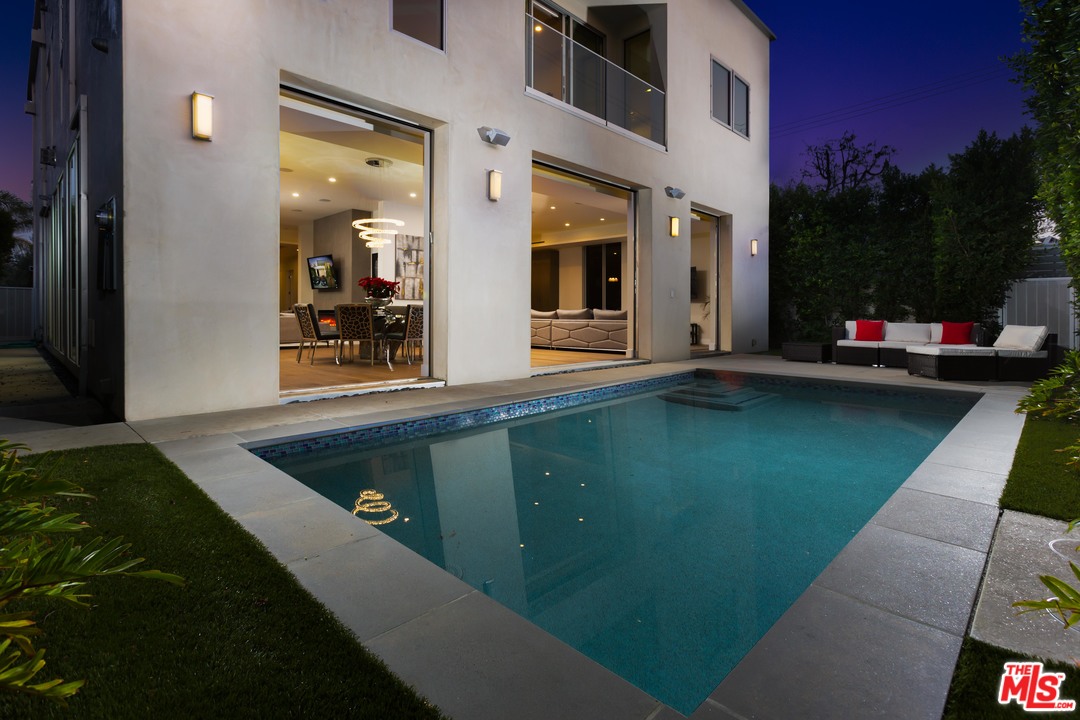 a view of outdoor space with swimming pool