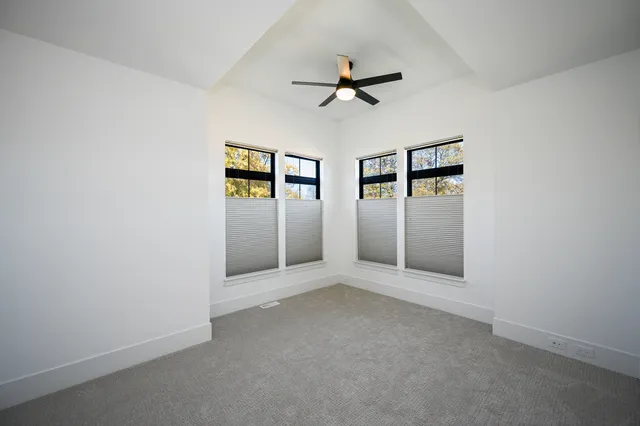 a view of a kitchen with electric appliances