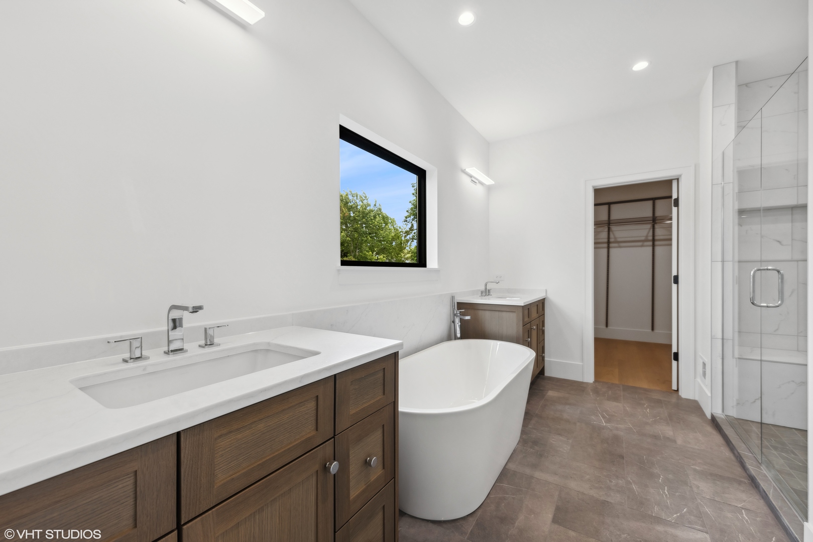 62 Miller Road Lake Zurich, IL 60047 - Photo 37 of 52 a spacious bathroom with a toilet sink and mirror