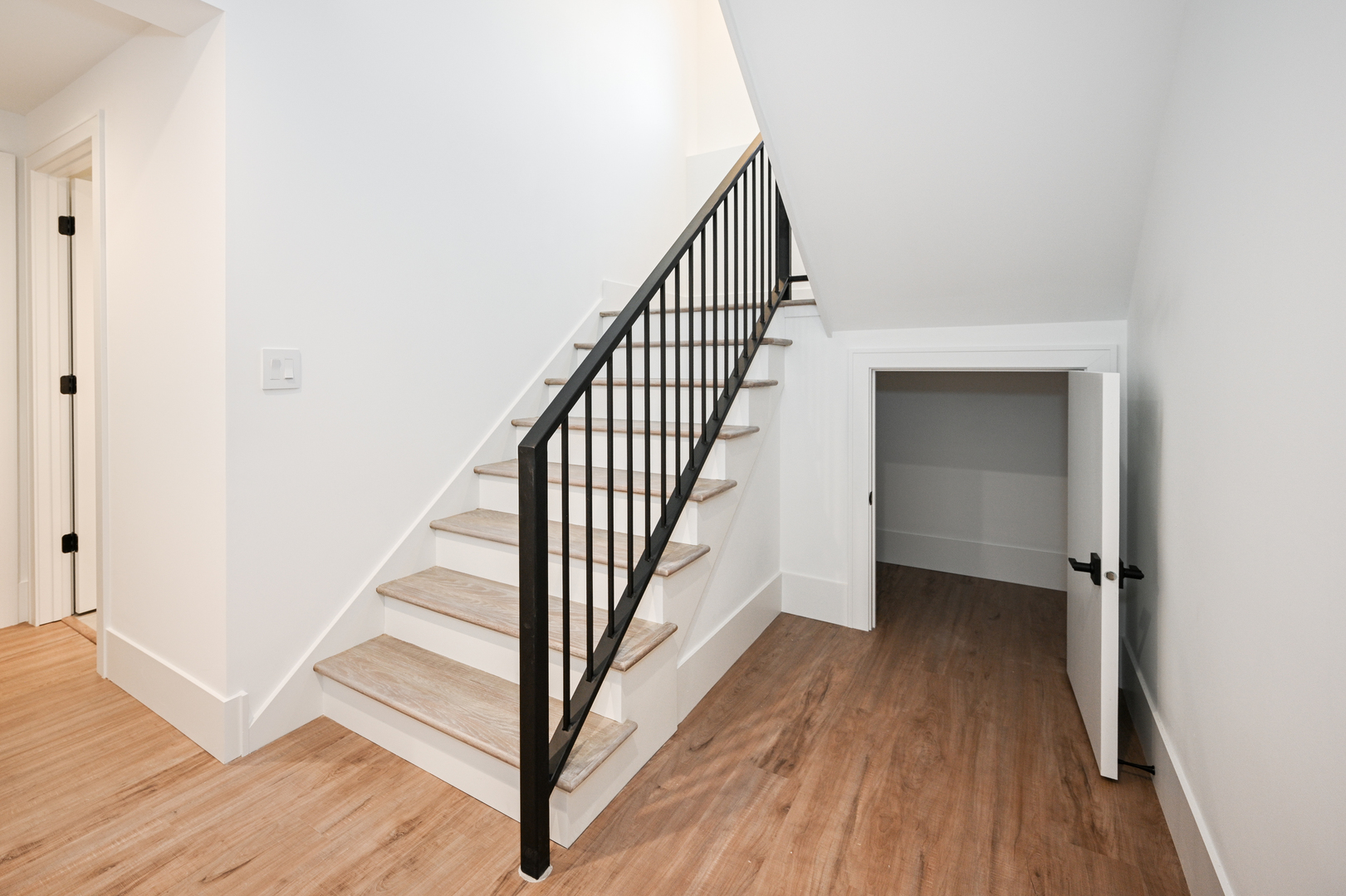 62 Miller Road Lake Zurich, IL 60047 - Photo 42 of 52 a view of a hallway with wooden floor and entryway