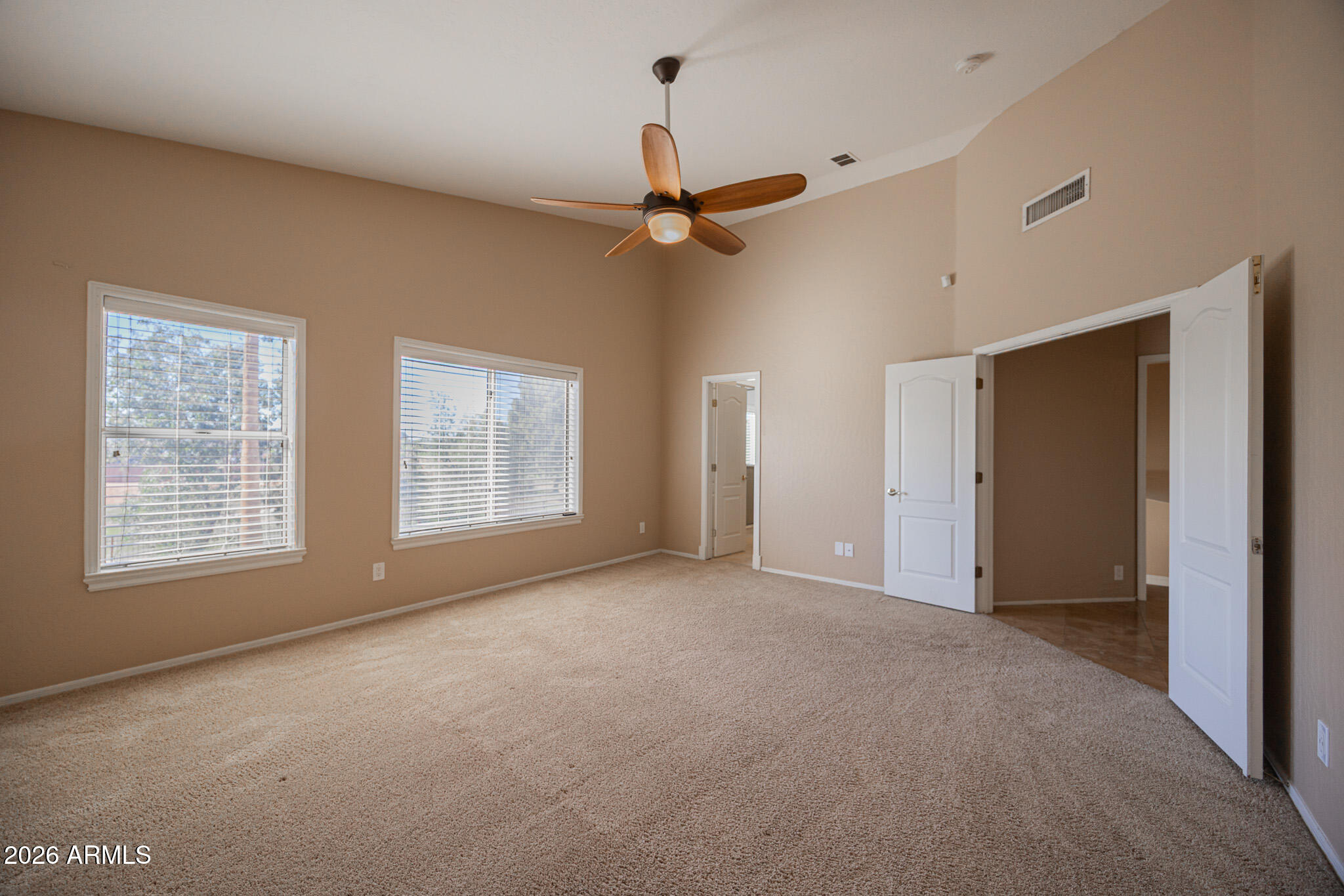 1767 West Redfield Road Gilbert, AZ 85233 - Photo 19 of 40 a view of an empty room with a window