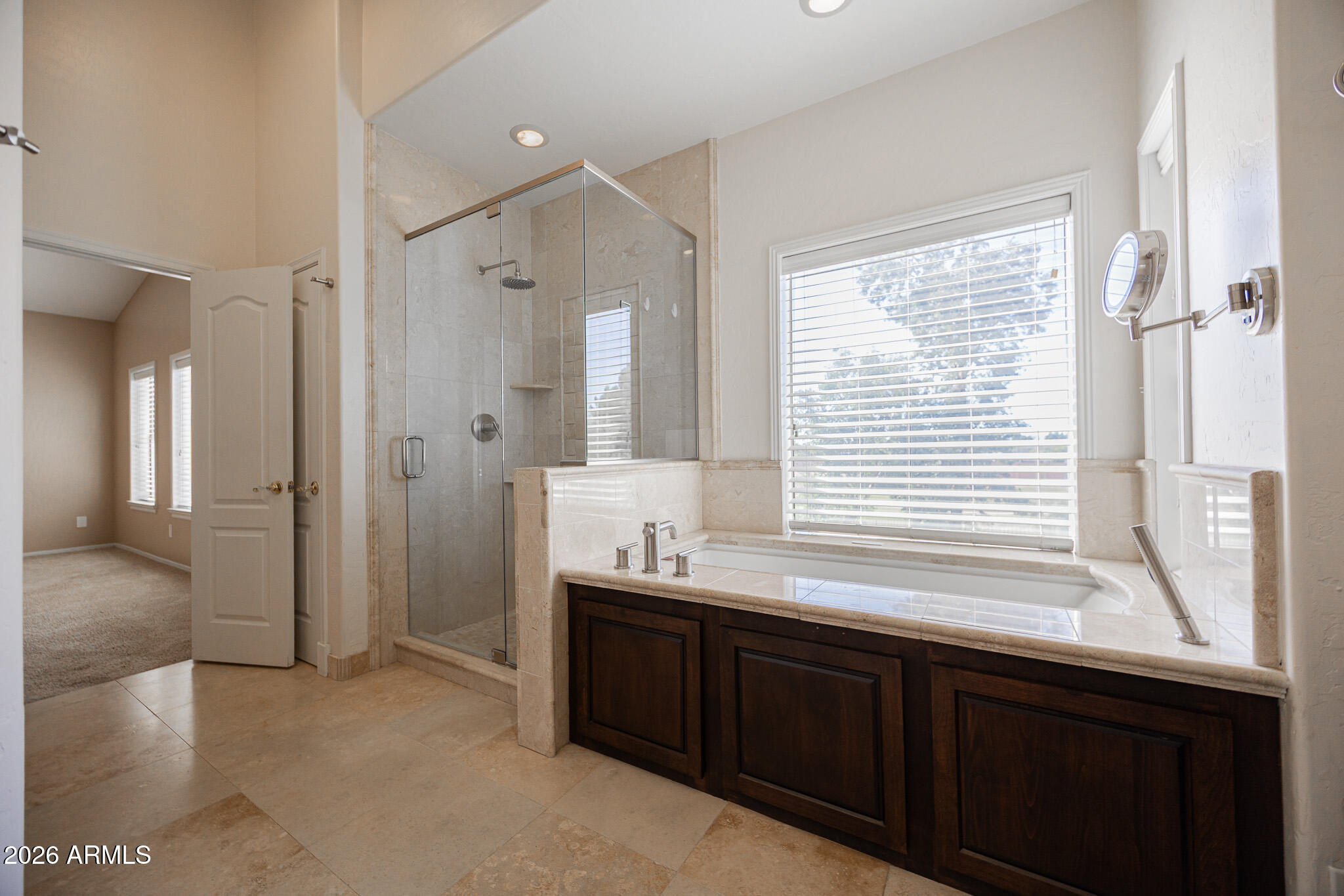 1767 West Redfield Road Gilbert, AZ 85233 - Photo 23 of 40 a bathroom with double vanity and a mirror