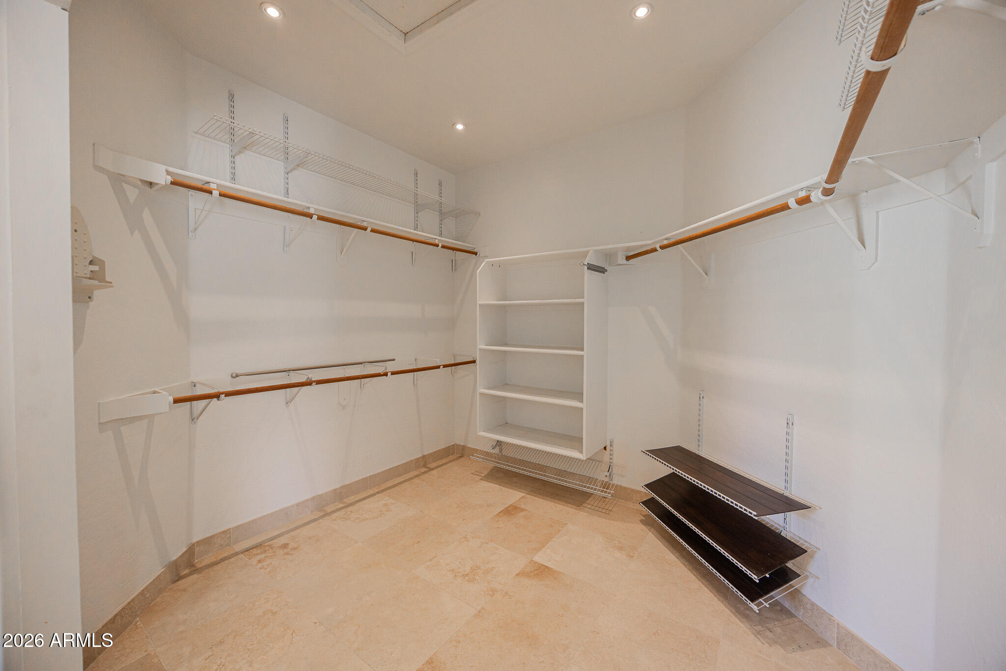 1767 West Redfield Road Gilbert, AZ 85233 - Photo 24 of 40 a view of a room with racks on the wall