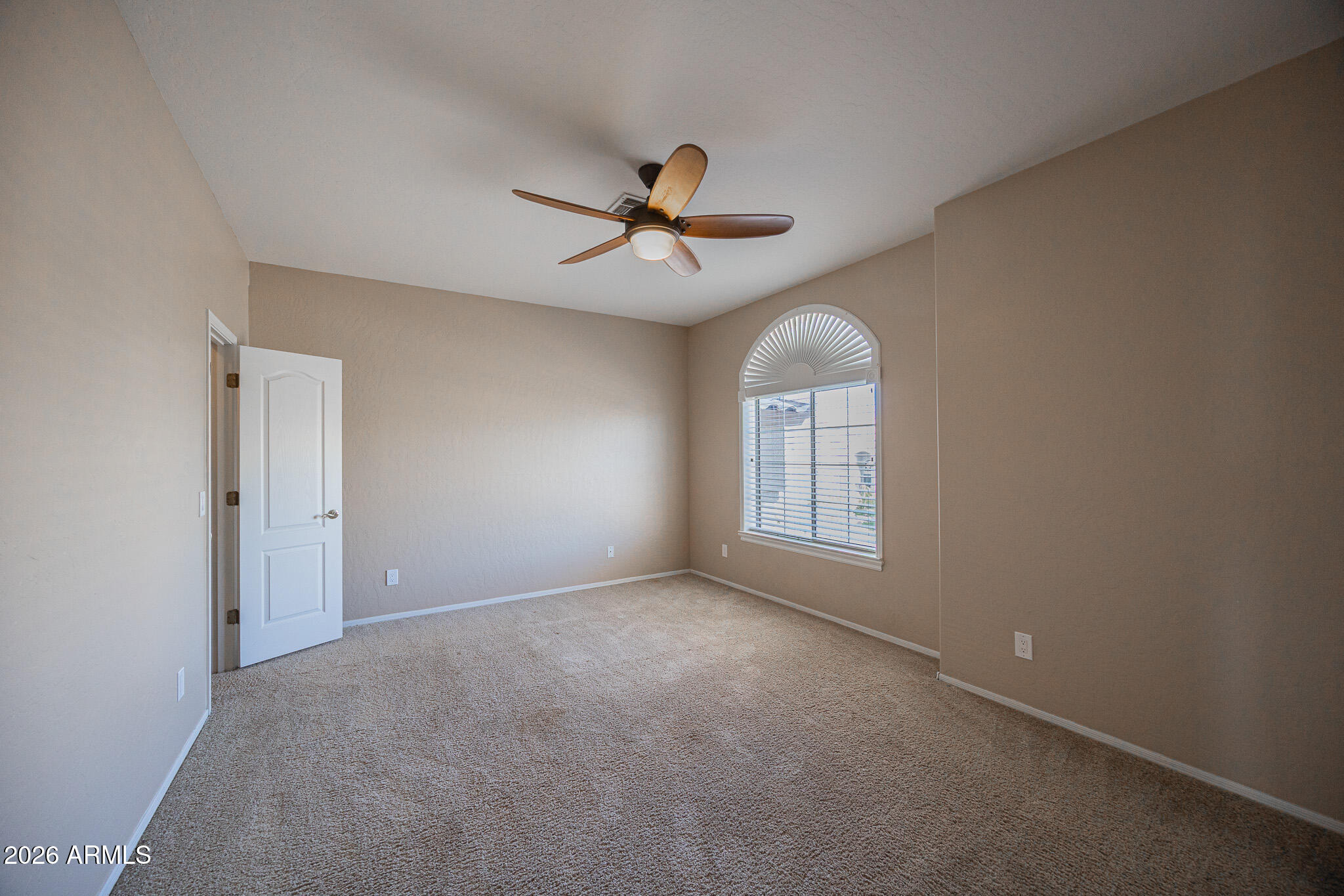 1767 West Redfield Road Gilbert, AZ 85233 - Photo 28 of 40 wooden floor in an empty room with a window