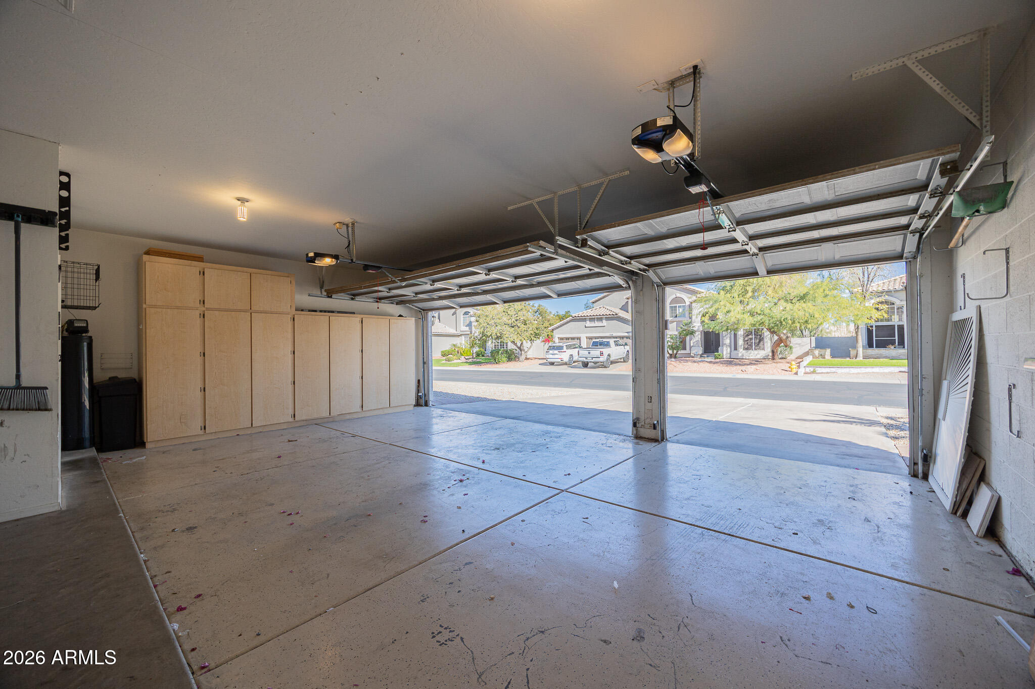 1767 West Redfield Road Gilbert, AZ 85233 - Photo 36 of 40 a view of empty room with wooden floor and fan