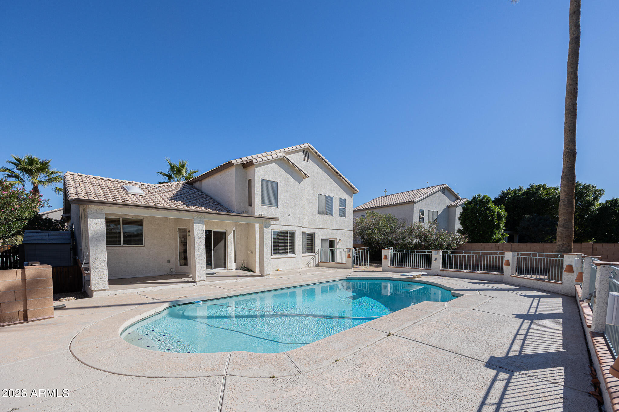 1767 West Redfield Road Gilbert, AZ 85233 - Photo 39 of 40 a front view of a house with a yard