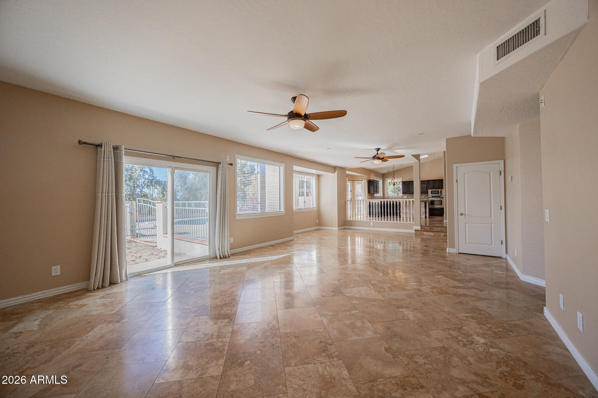 1767 West Redfield Road Gilbert, AZ 85233 - Photo 6 of 40 a view of an empty room with a window