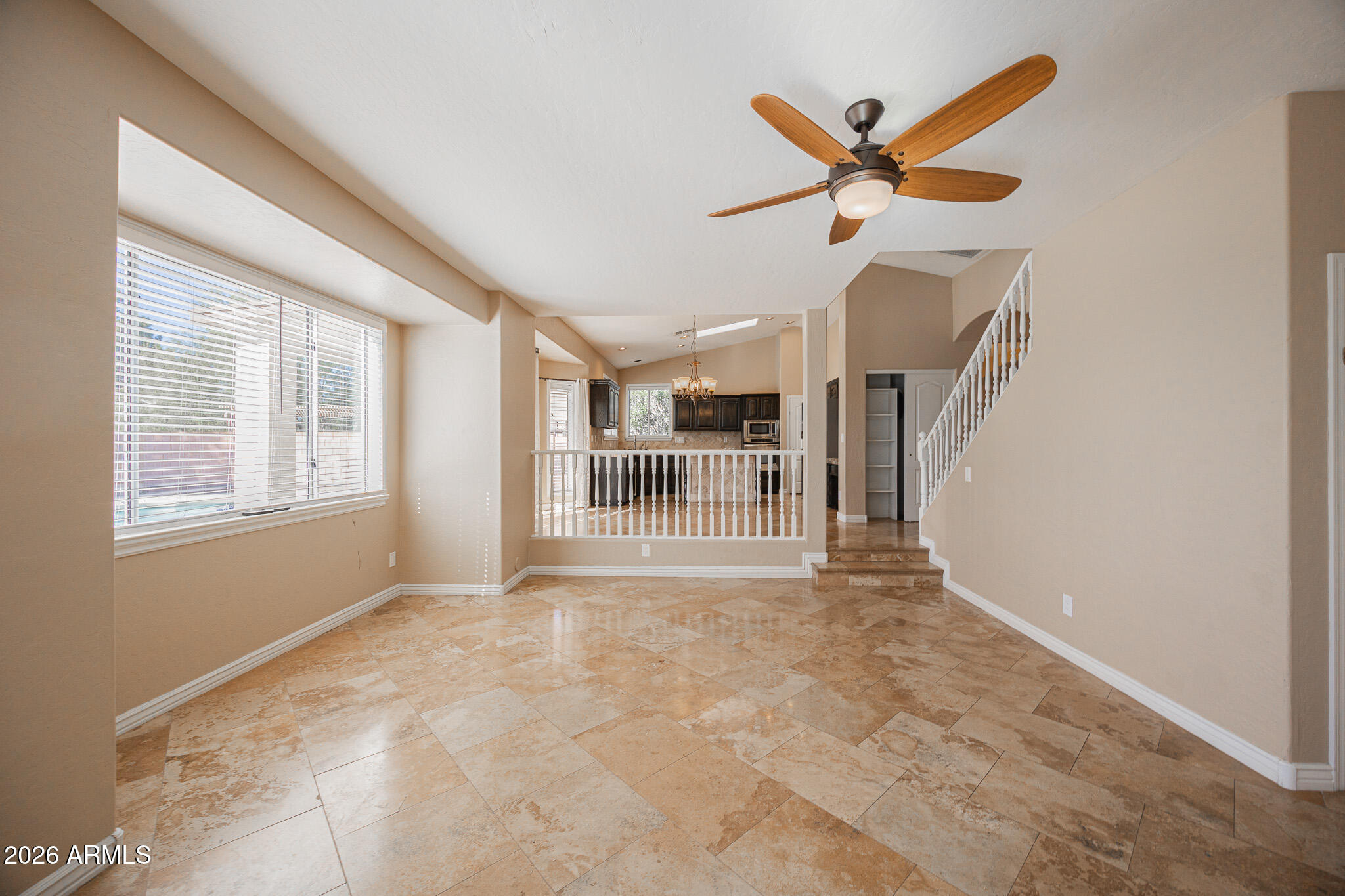 1767 West Redfield Road Gilbert, AZ 85233 - Photo 8 of 40 a view of a livingroom with a ceiling fan and window