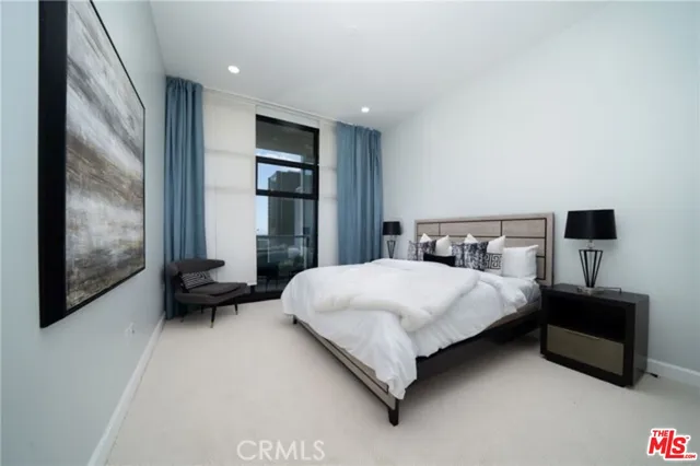 a room with a sink and a mirror