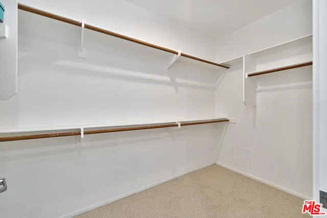 a view of a back yard from a balcony