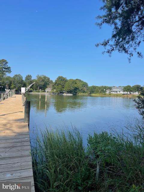 33 Lagrange Avenue Kilmarnock, VA 22482 - Photo 1 of 84 a view of a lake with houses in the back