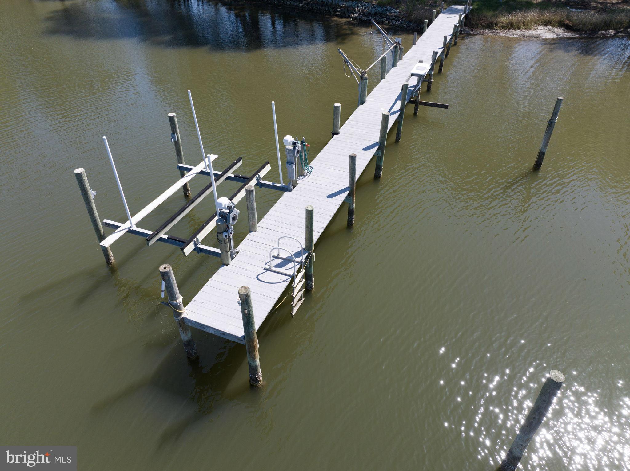 33 Lagrange Avenue Kilmarnock, VA 22482 - Photo 20 of 84 Navigable water with dock and boat lift.