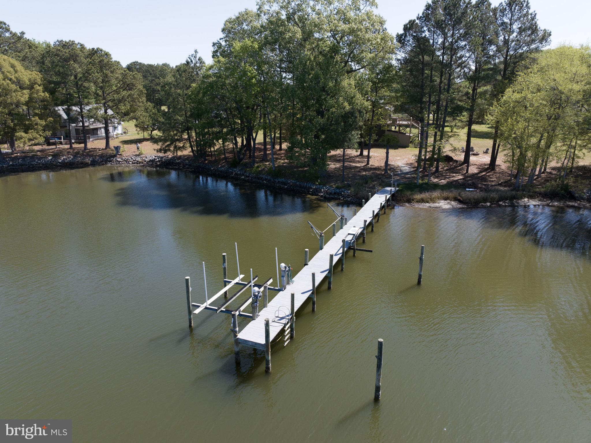 33 Lagrange Avenue Kilmarnock, VA 22482 - Photo 21 of 84 Navigable water with dock and boat lift.