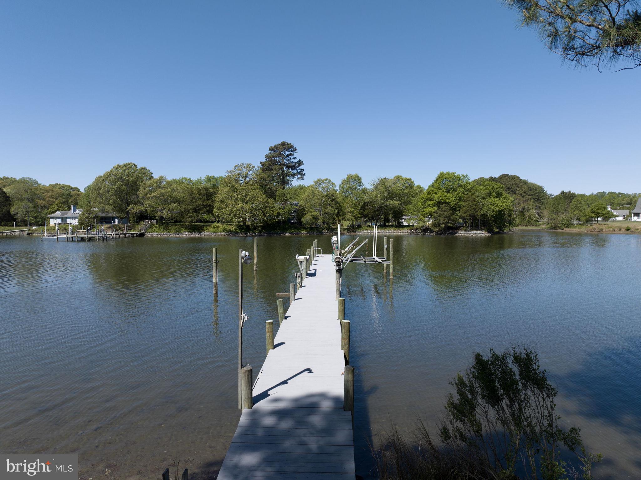 33 Lagrange Avenue Kilmarnock, VA 22482 - Photo 24 of 84 a view of a lake with houses in the back