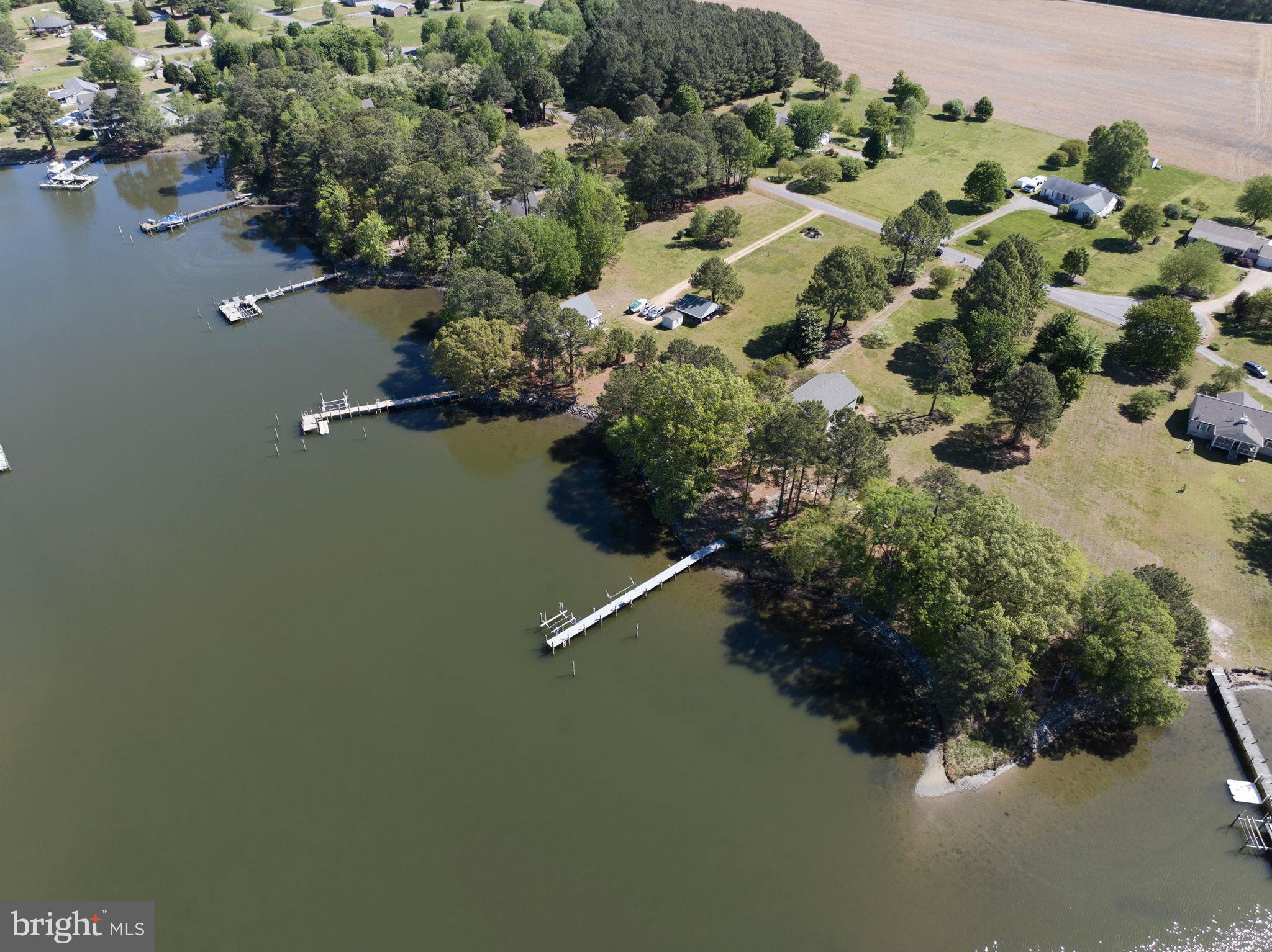 33 Lagrange Avenue Kilmarnock, VA 22482 - Photo 43 of 84 an aerial view of a house with a yard and lake view