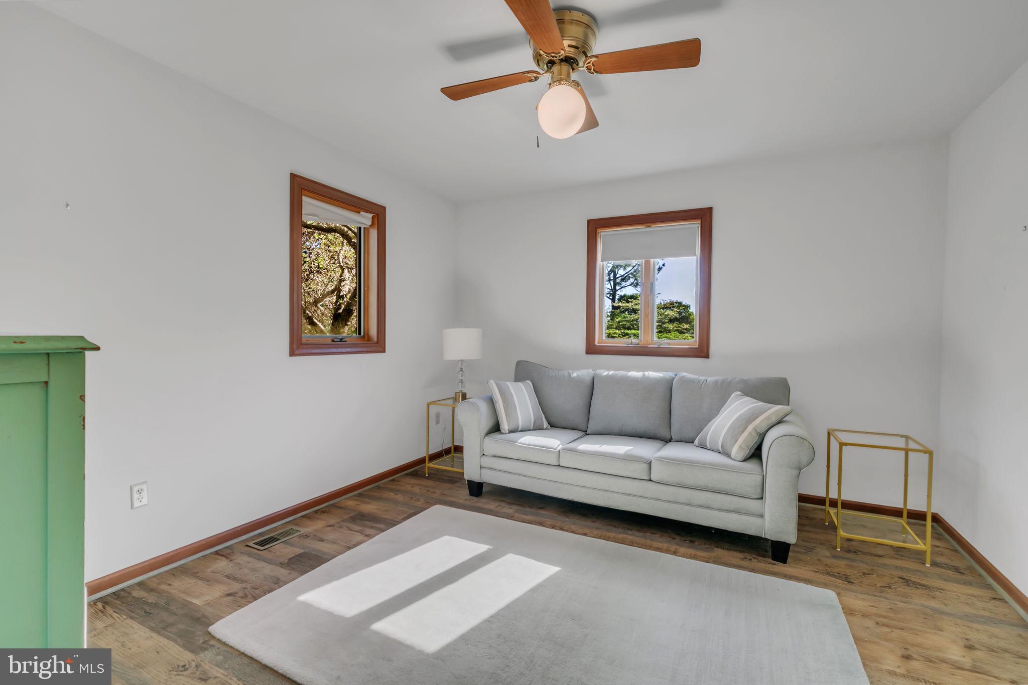 33 Lagrange Avenue Kilmarnock, VA 22482 - Photo 55 of 84 a living room with furniture and a rug