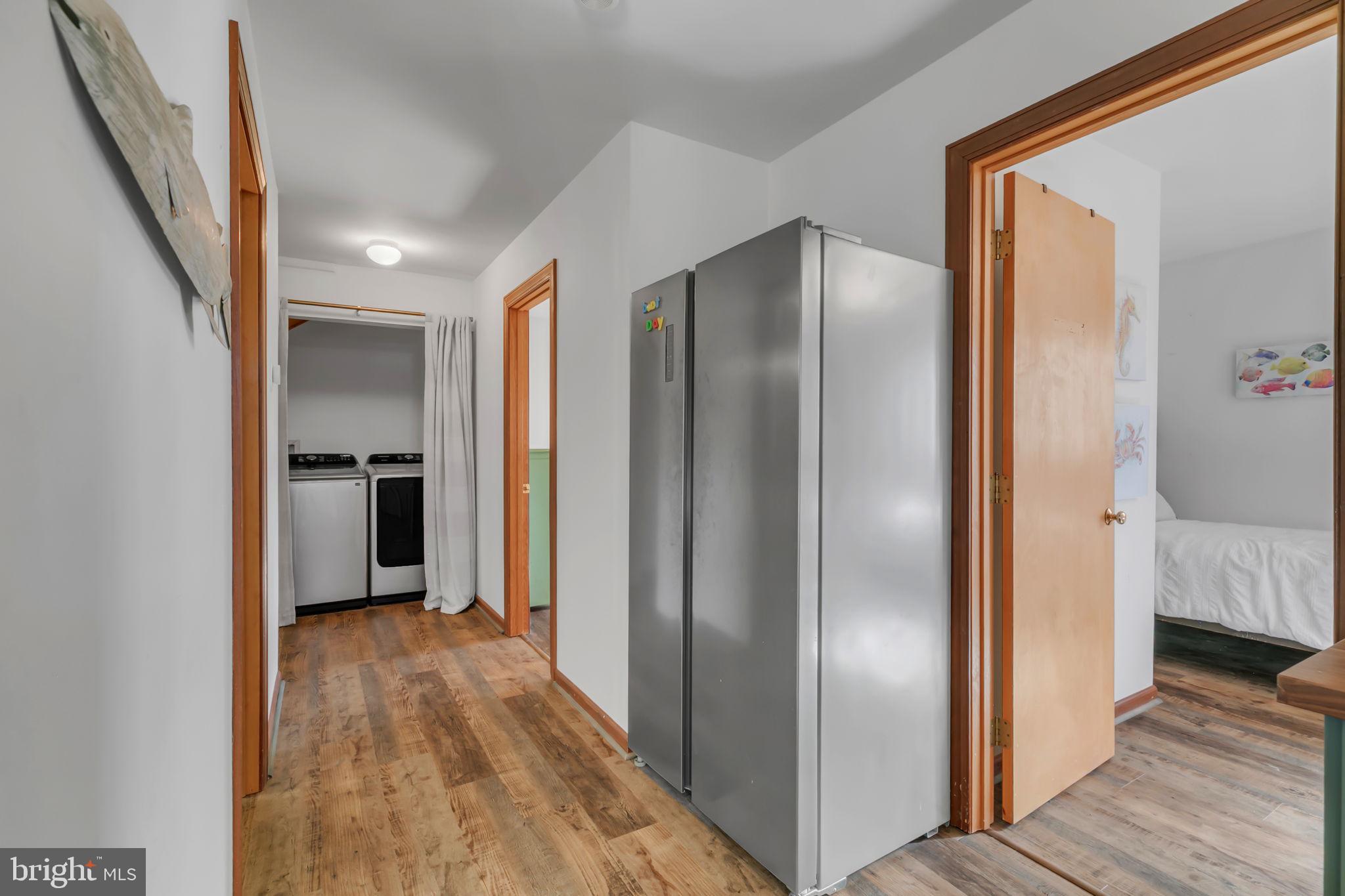 33 Lagrange Avenue Kilmarnock, VA 22482 - Photo 59 of 84 Bright and inviting hallway view.