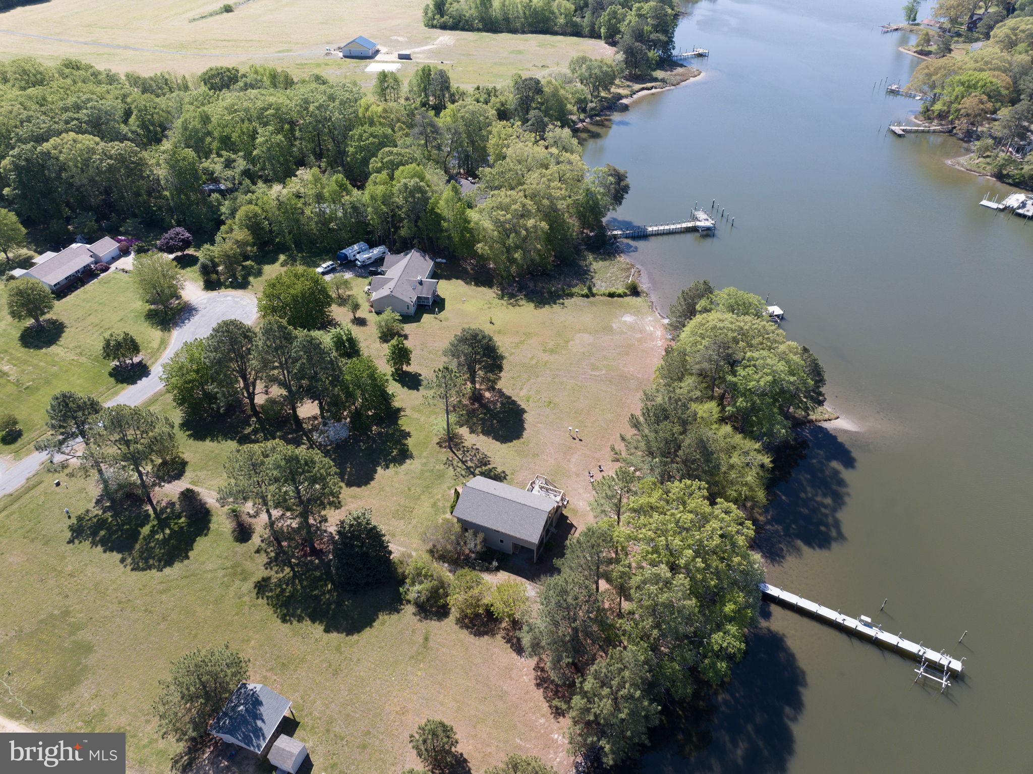 33 Lagrange Avenue Kilmarnock, VA 22482 - Photo 8 of 84 an aerial view of a house with a yard and plants