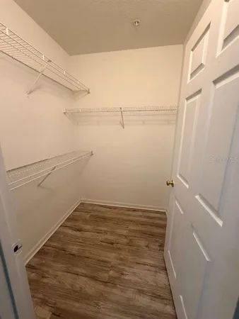 a view of a room with racks on the wall