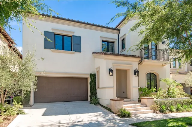 a front view of a house with yard