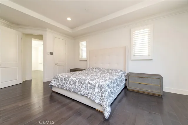 a large spacious bathroom with a large tub sink and window