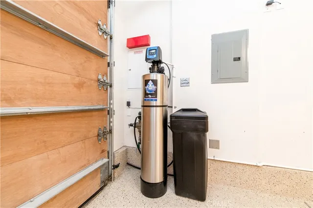 a view of front door and potted plants