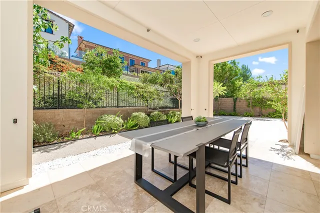 a view of a work space with wooden floor and furniture