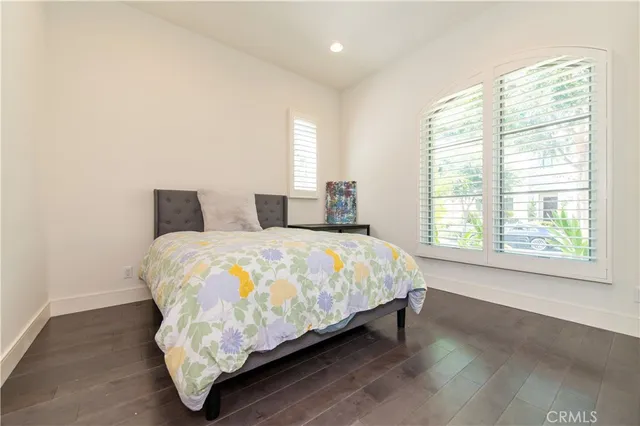 a room with furniture and wooden floor