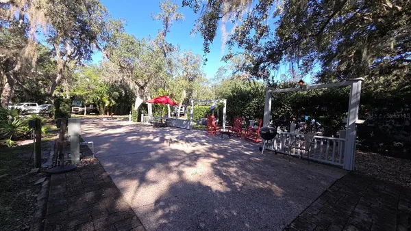 a view of outdoor space with garden and patio