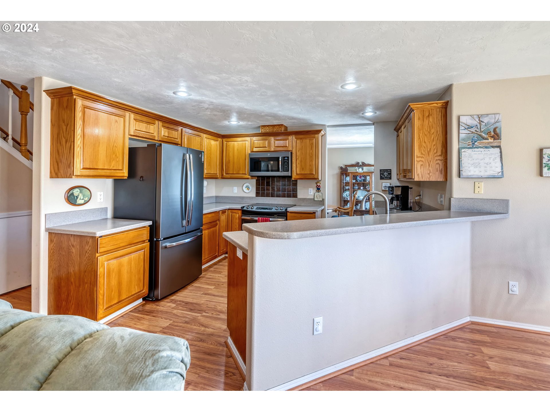 2278 33rd Street Springfield, OR 97477 - Photo 12 of 41 a kitchen view with appliances a counter space and a window