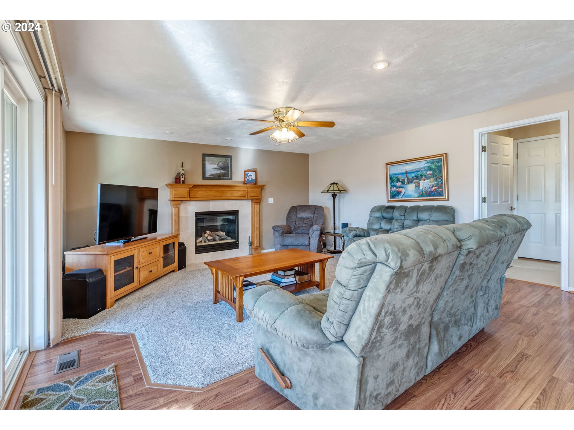 2278 33rd Street Springfield, OR 97477 - Photo 15 of 41 a living room with furniture and a fireplace