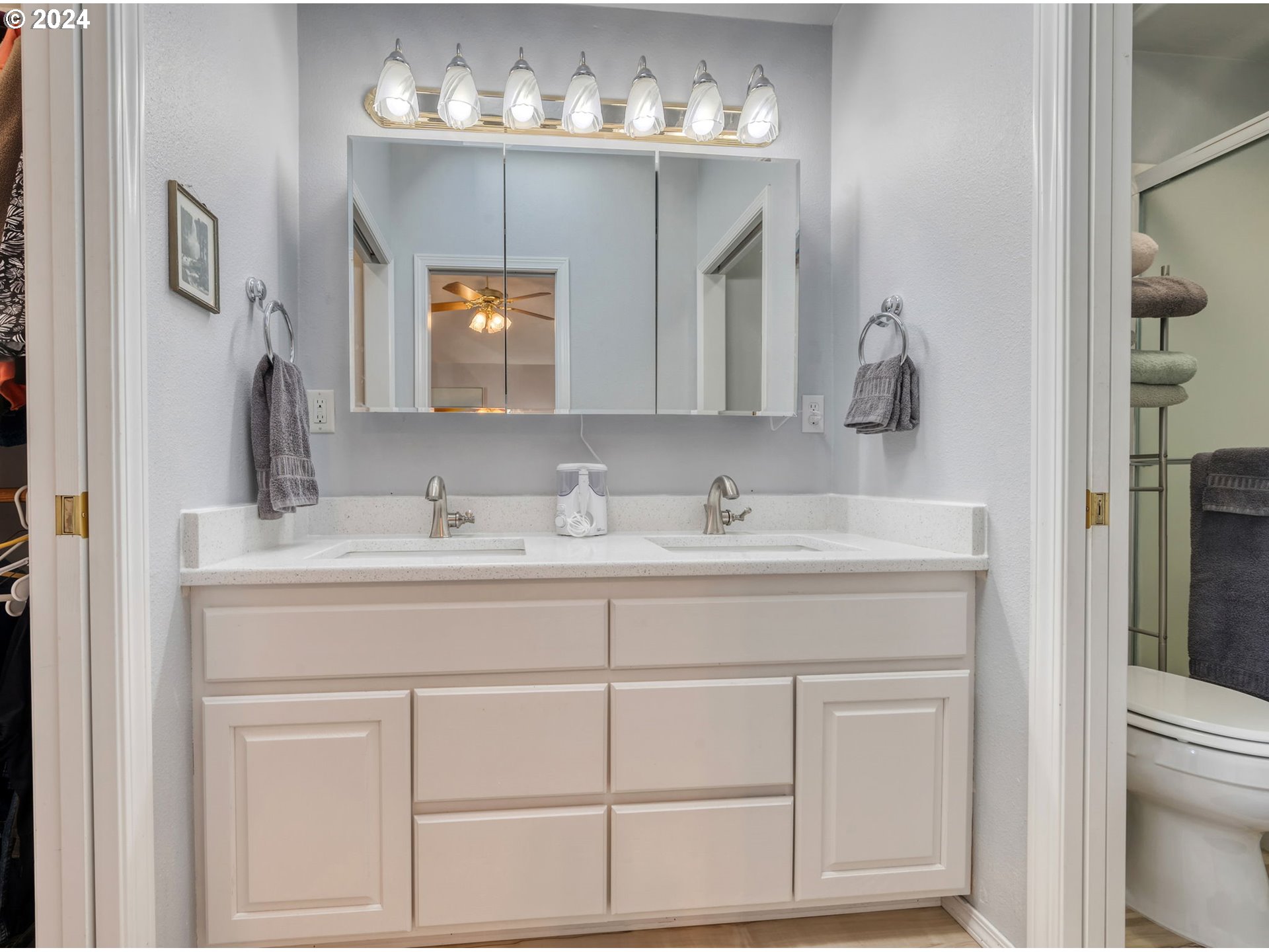 2278 33rd Street Springfield, OR 97477 - Photo 23 of 41 a bathroom with a sink vanity and mirror