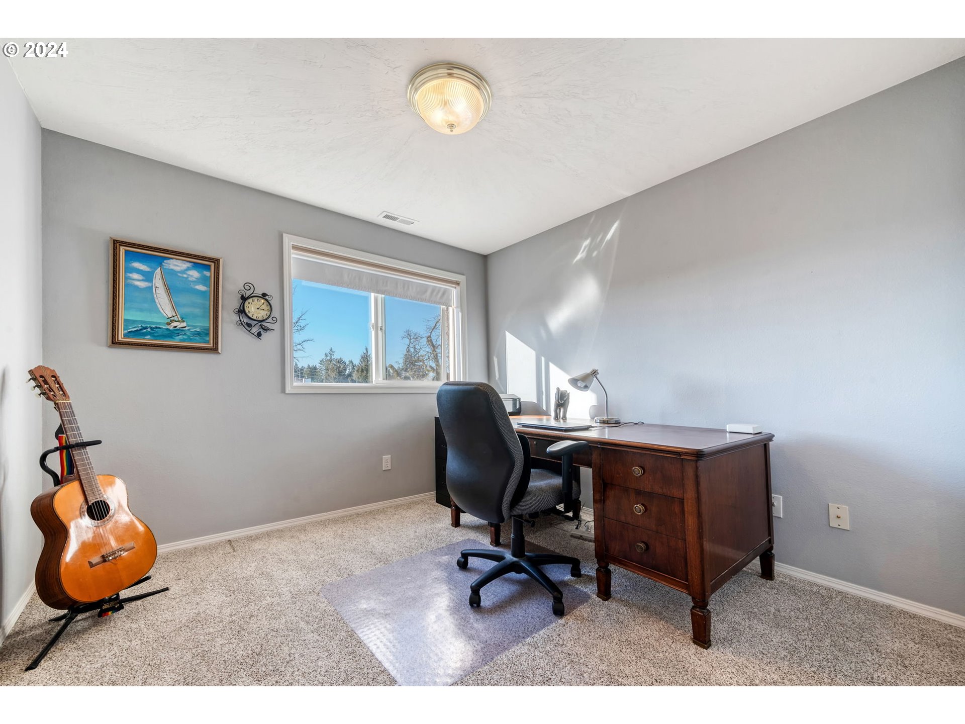 2278 33rd Street Springfield, OR 97477 - Photo 26 of 41 a workspace with furniture and a window