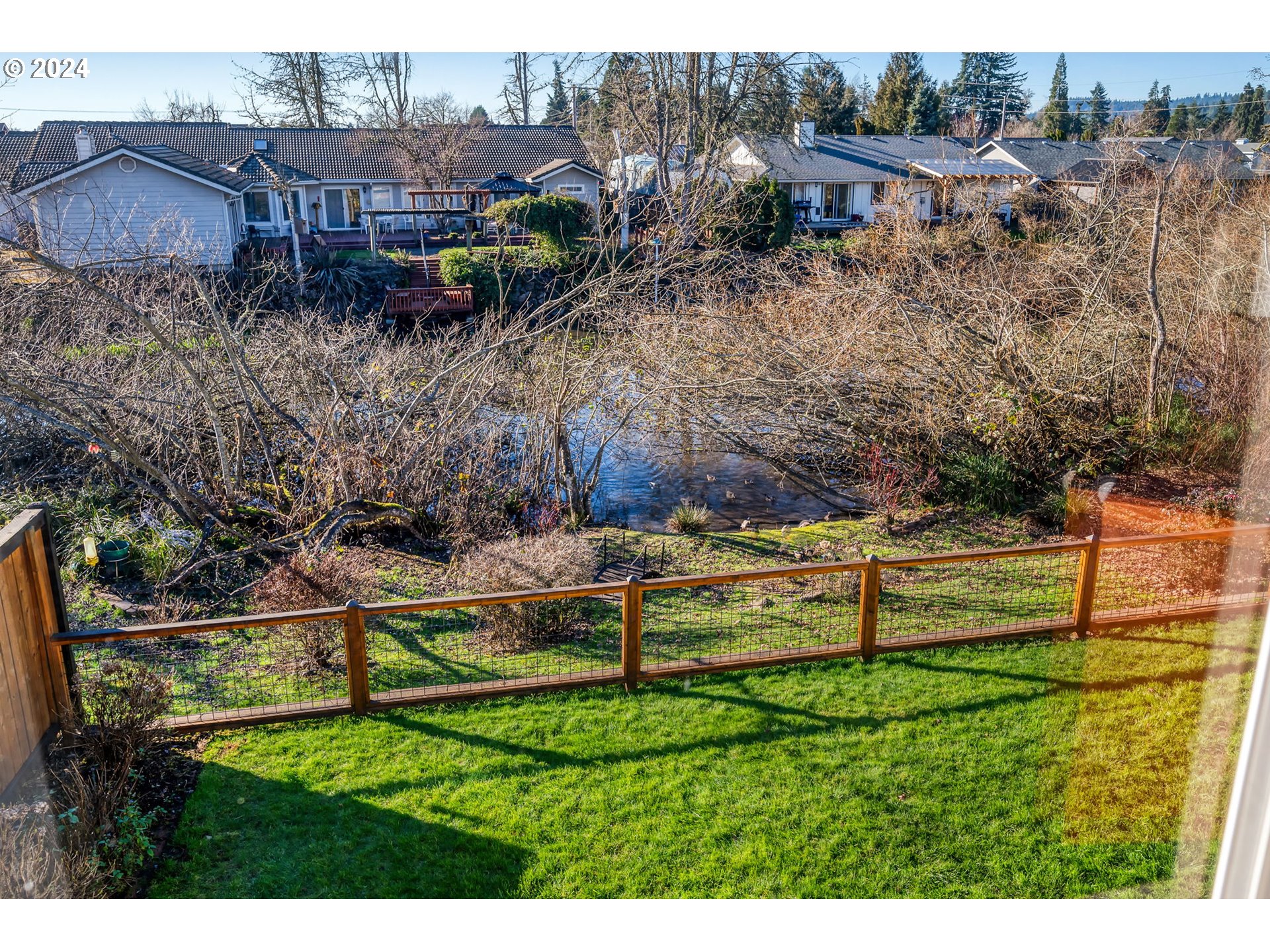 2278 33rd Street Springfield, OR 97477 - Photo 29 of 41 a view of backyard with seating area and trees