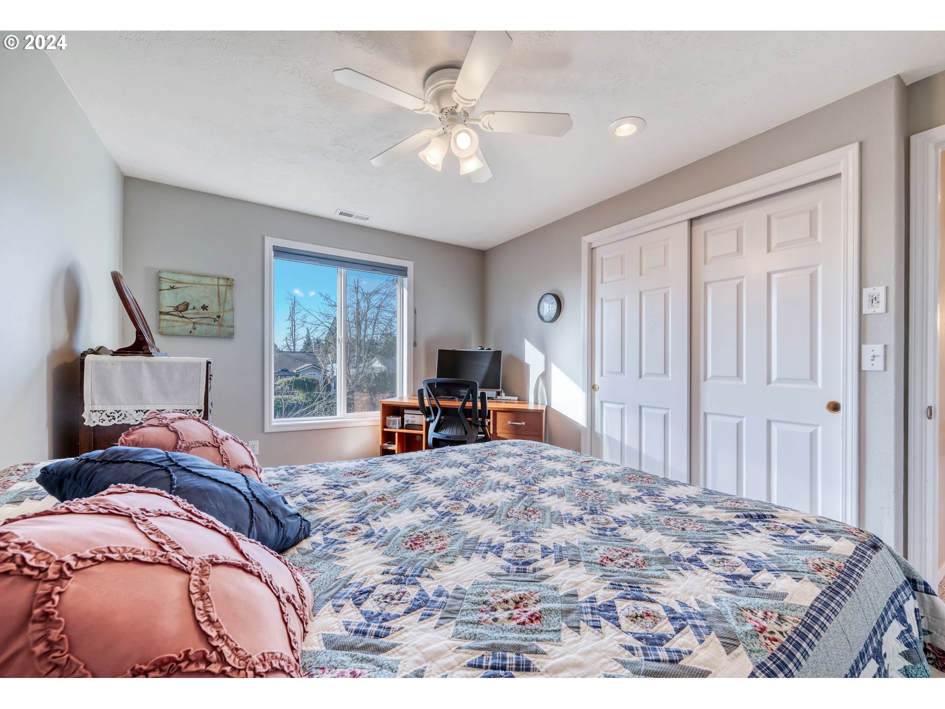 2278 33rd Street Springfield, OR 97477 - Photo 30 of 41 a bed room with a bed and a large window