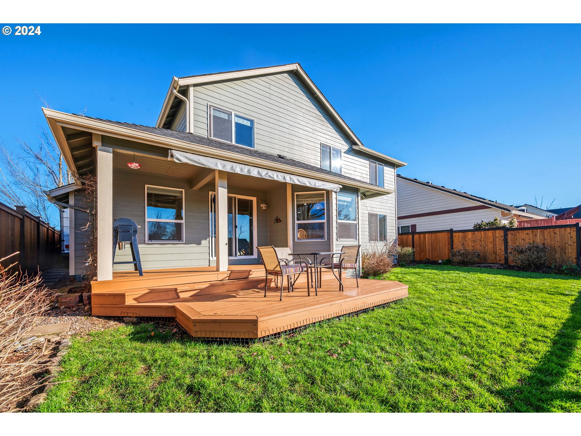 2278 33rd Street Springfield, OR 97477 - Photo 35 of 41 a backyard of a house with table and chairs