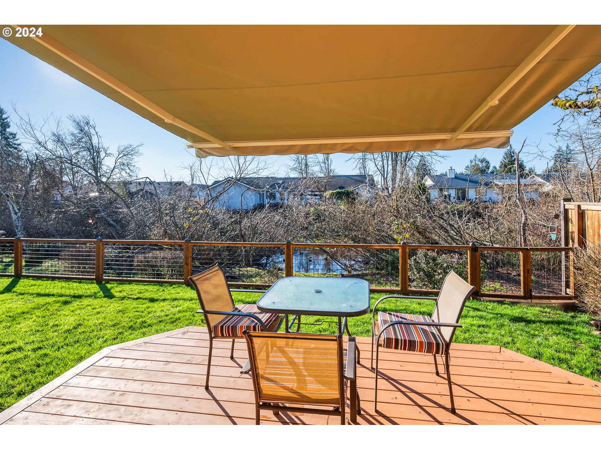 2278 33rd Street Springfield, OR 97477 - Photo 36 of 41 a view of a chairs and table in patio with a yard