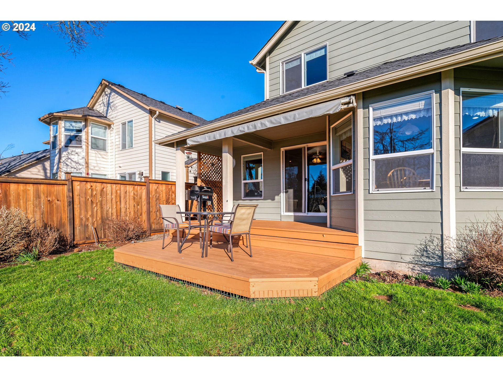 2278 33rd Street Springfield, OR 97477 - Photo 38 of 41 a view of a house with patio and a garden