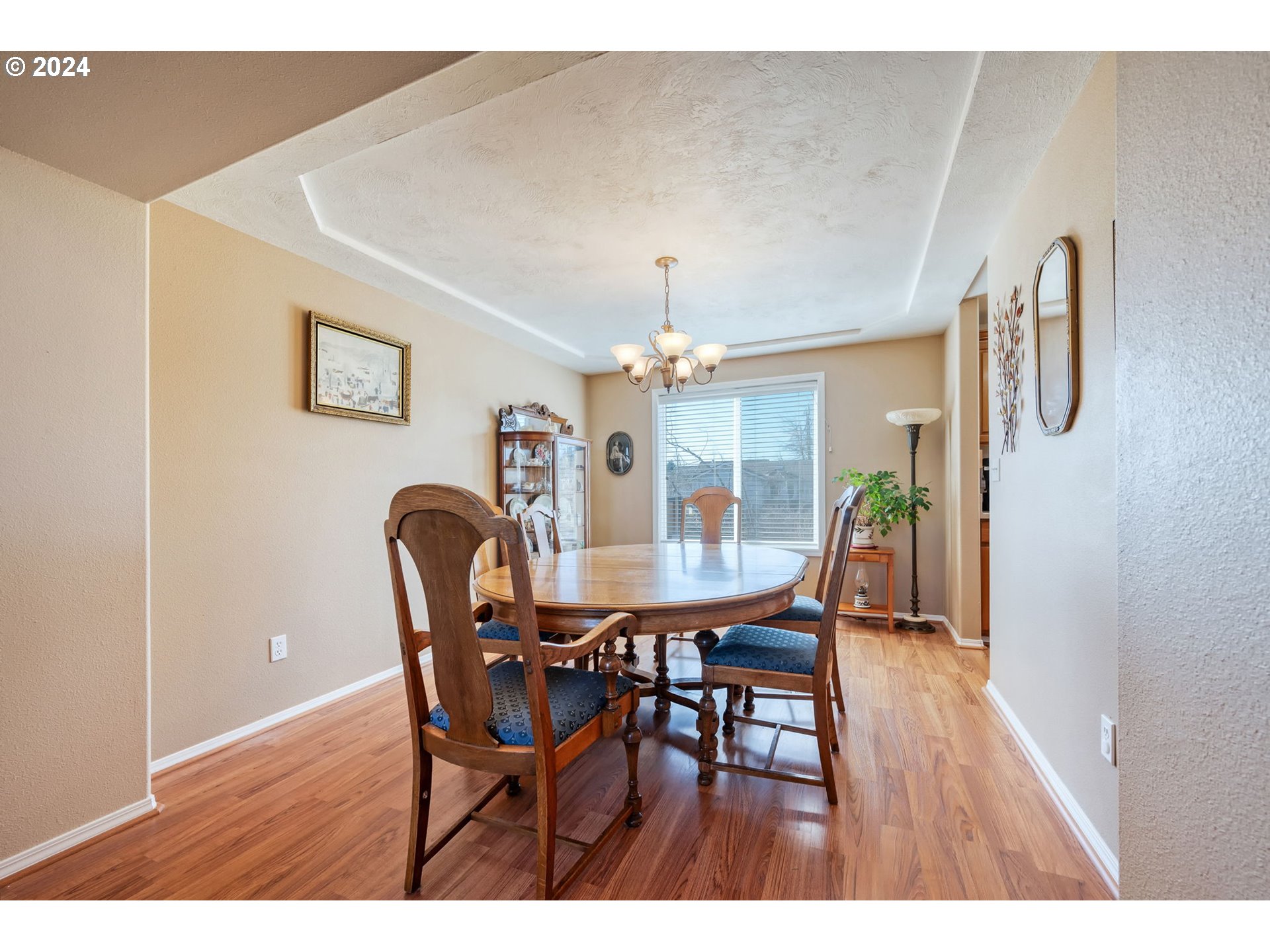 2278 33rd Street Springfield, OR 97477 - Photo 10 of 41 a view of a dining room with furniture and chandelier