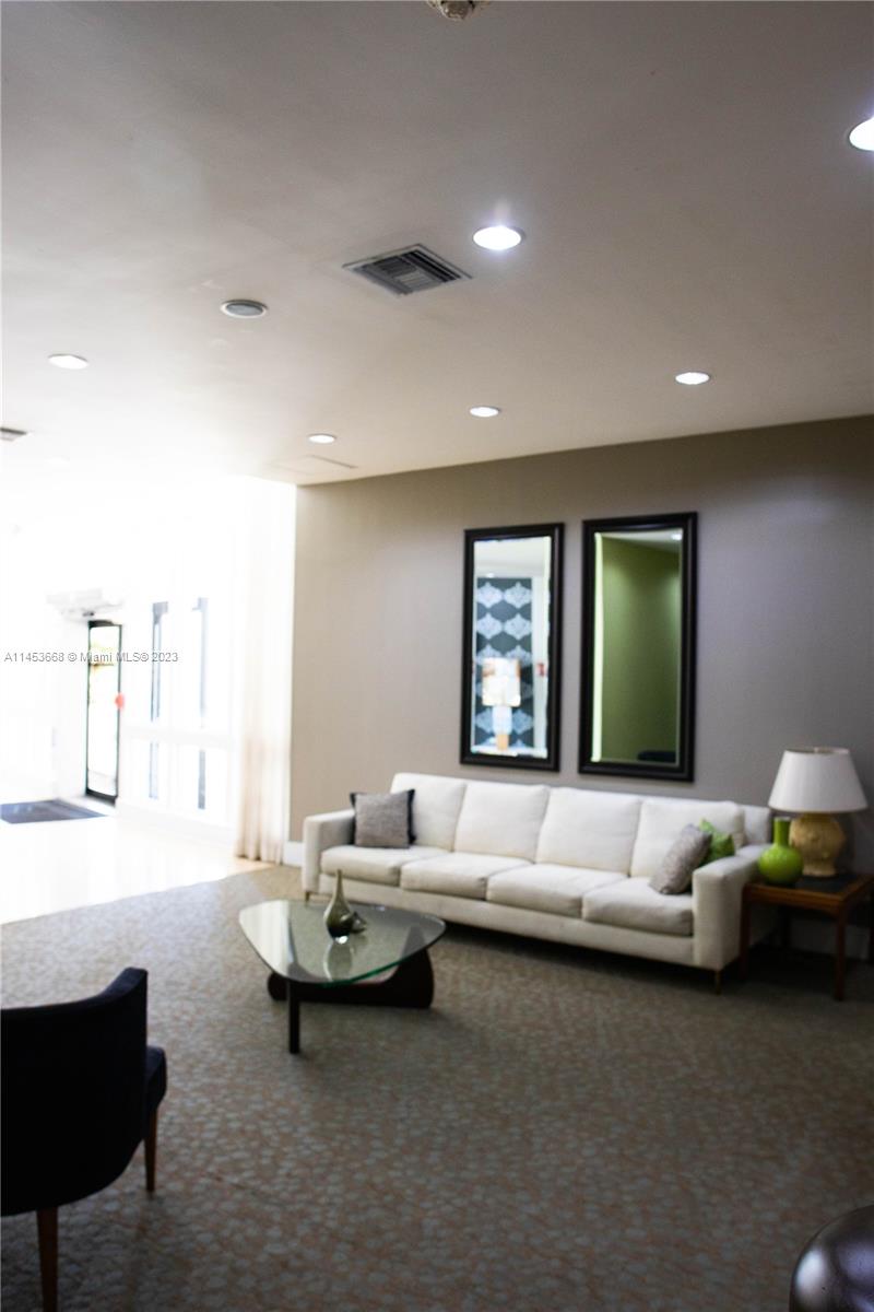 North Beach Miami Beach, FL 33141 - Photo 25 of 30 a living room with furniture and a window