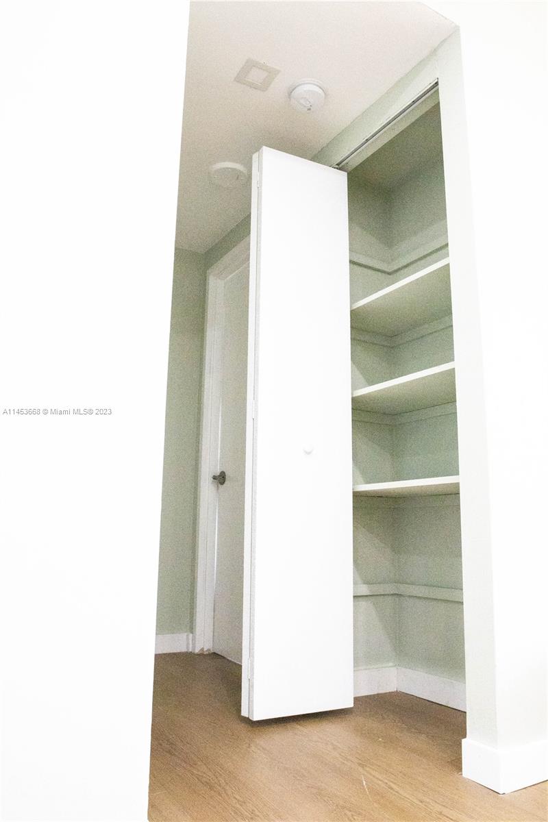 North Beach Miami Beach, FL 33141 - Photo 6 of 30 a view of a room with a door and a cabinet