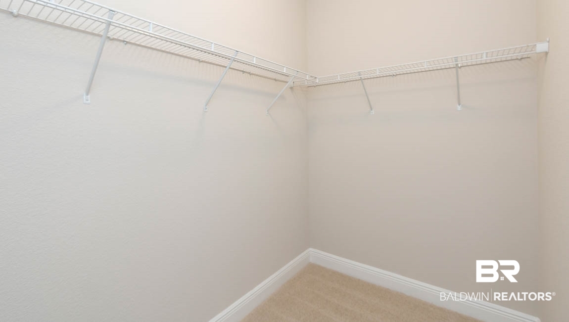 9348 Impala Drive, Unit 21 Foley, AL 36535 - Photo 15 of 22 Master closet