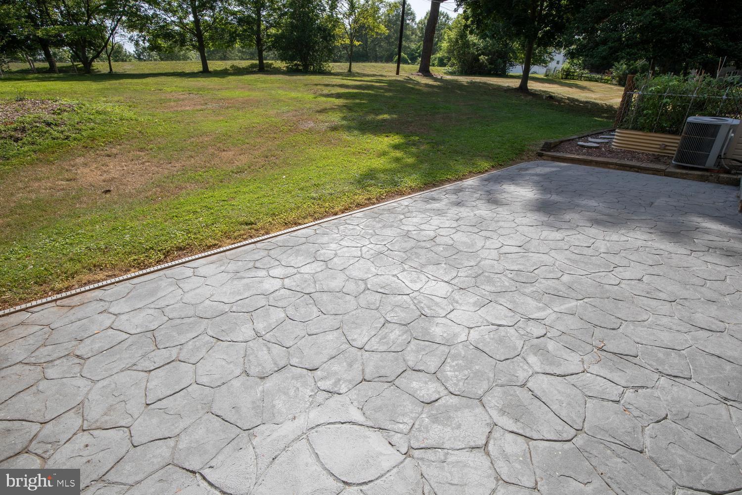 205 Taylorsville Road Yardley, PA 19067 - Photo 42 of 47 Stamped concrete patio adds some pizazz!