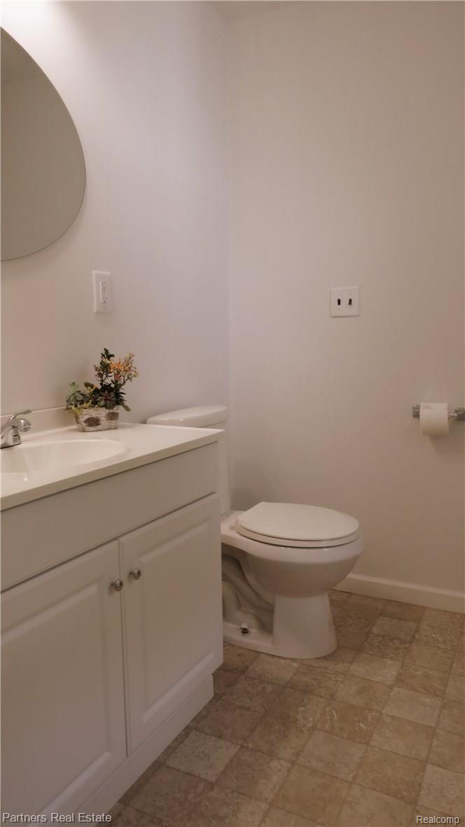 4850 Deal Road Fowlerville, MI 48836 - Photo 20 of 49 Lav Nicely presented with Warm Neutral Colors.