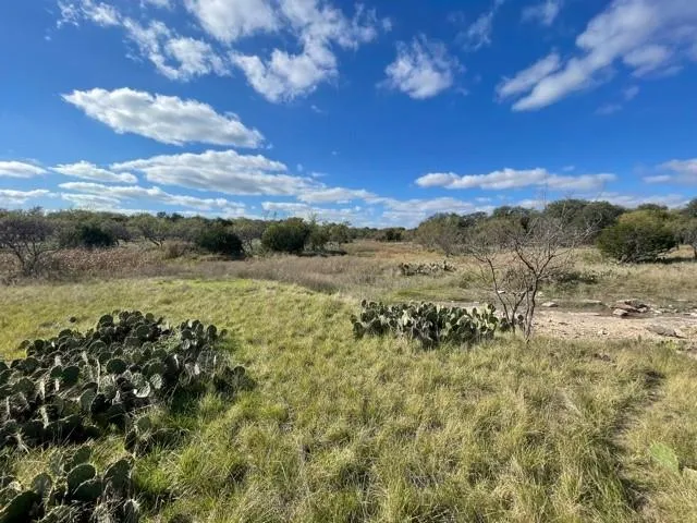 a view of mountain with sunset