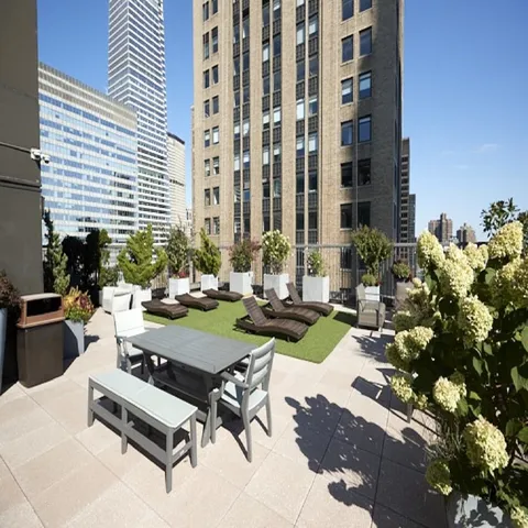 a view of a terrace with furniture