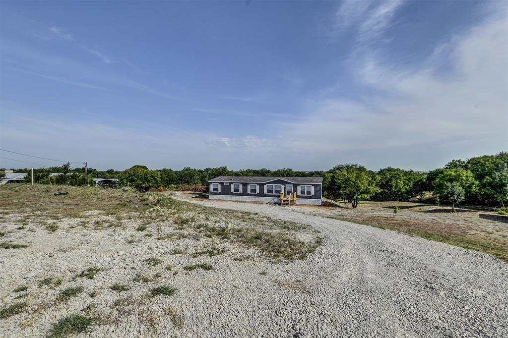 a view of a road with an ocean view