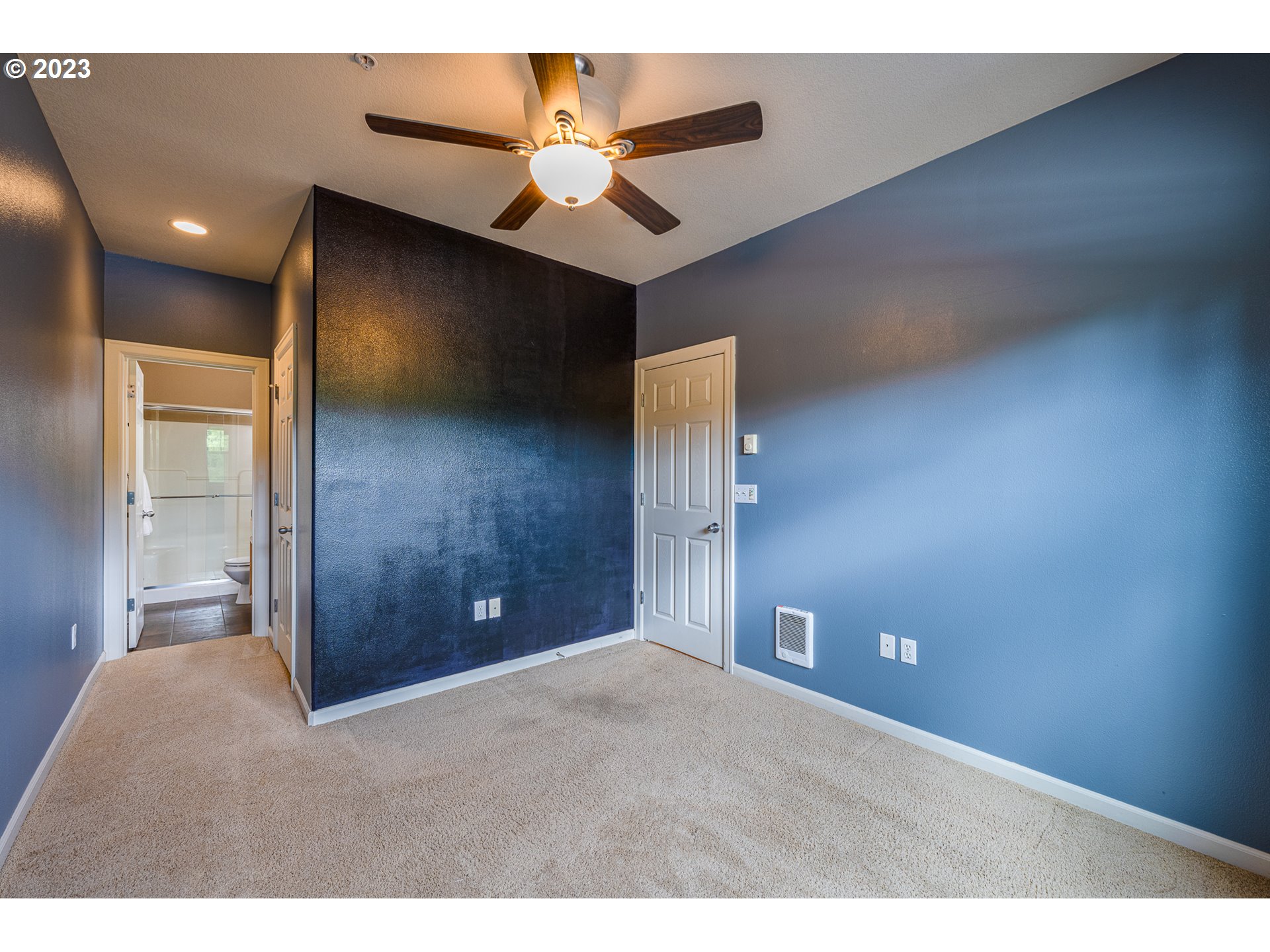 17335 Ruben Lane, Unit 19 Sandy, OR 97055 - Photo 11 of 27 a view of a livingroom with a ceiling fan